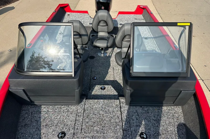 Slide: The Image of 2026 Tracker Pro Guide V-175 WT boat interior with seating and windshields. - 7