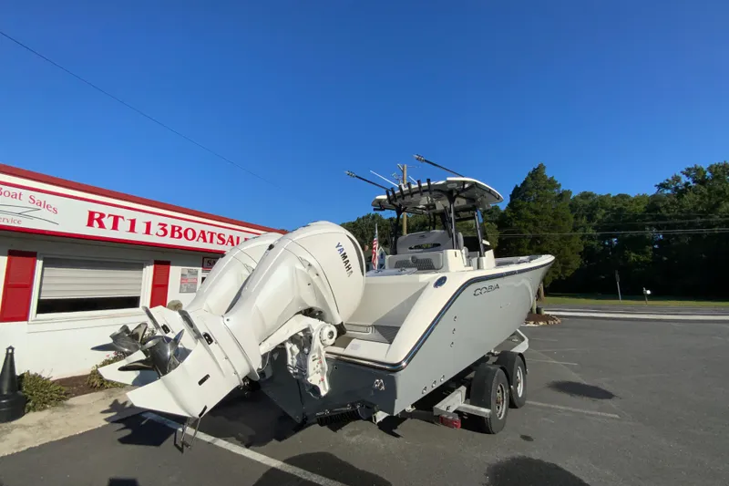 Slide: The Image of 2026 Cobia 305 Center Console boat with Yamaha engines at RT113 Boat Sales. - 11