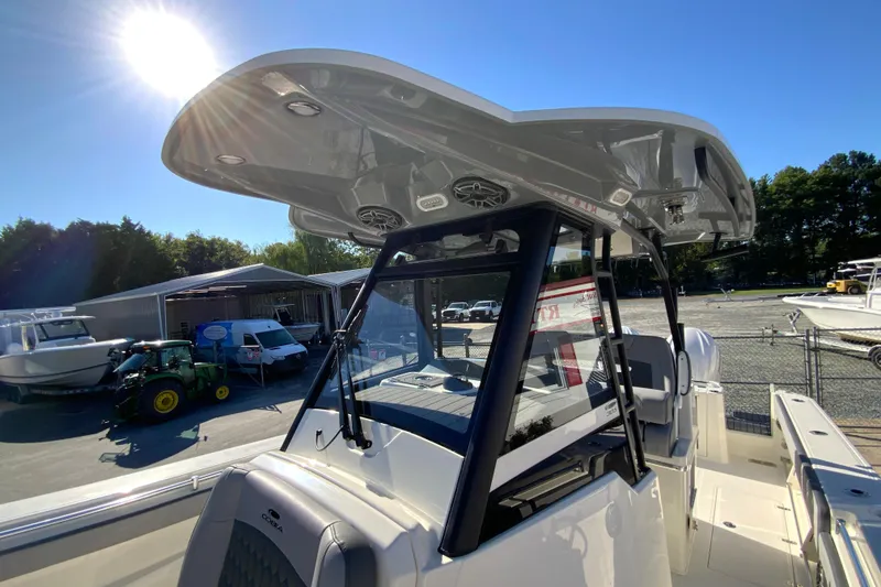 Slide: The Image of 2026 Cobia 305 Center Console boat with sleek design and modern features. - 72