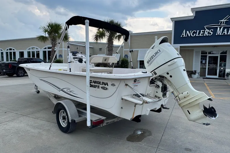Slide: The Image of 2019 Carolina Skiff 218 DLV boat with Suzuki outboard motor at Anglers Marine. - 4