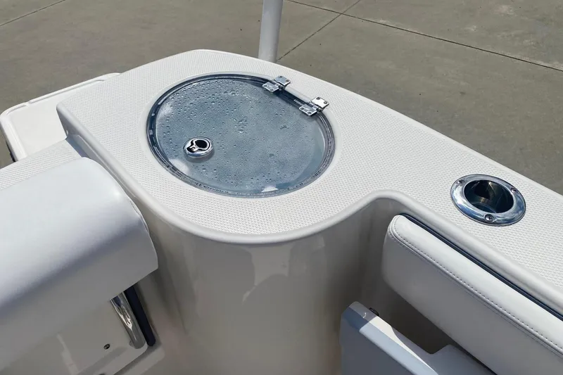 Slide: The Image of 2021 Robalo R272 Center Console livewell and cup holder detail. - 10