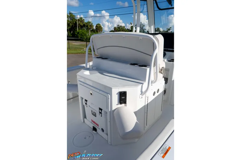 Slide: The Image of 2025 Sea Hunt Ultra 245 SE boat interior with seating and storage compartments. - 41