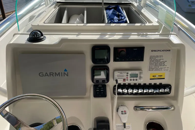 Slide: The Image of Control panel of a 2014 Sailfish 220 CC boat with Garmin navigation system. - 5