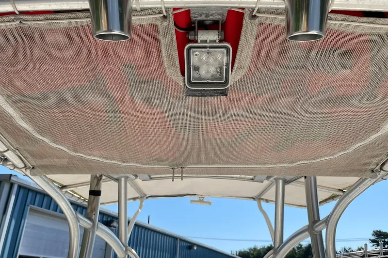 Slide: The Image of 2014 Sailfish 220 CC boat canopy with LED light and metal frame. - 8