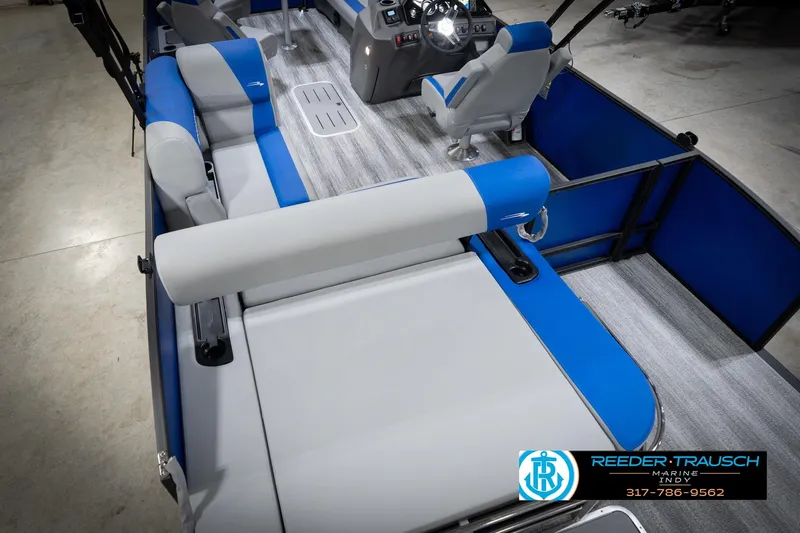 Slide: The Image of 2026 Bennington 22 SSB pontoon boat interior with blue and gray seating. - 15