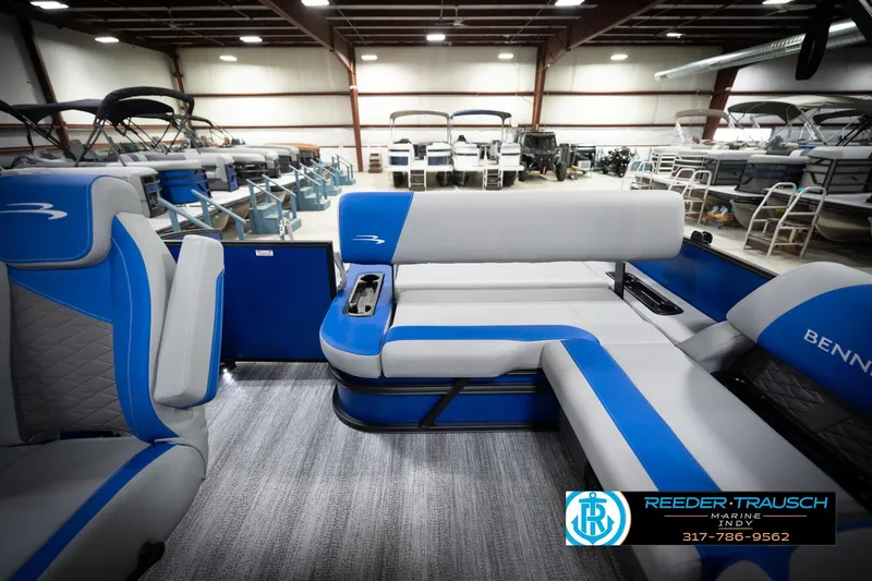 Slide: The Image of Interior of 2026 Bennington 22 SSB pontoon boat with blue and gray seating. - 18