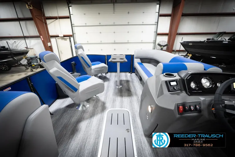 Slide: The Image of Interior of 2026 Bennington 22 SSB pontoon boat with blue and gray seating. - 20