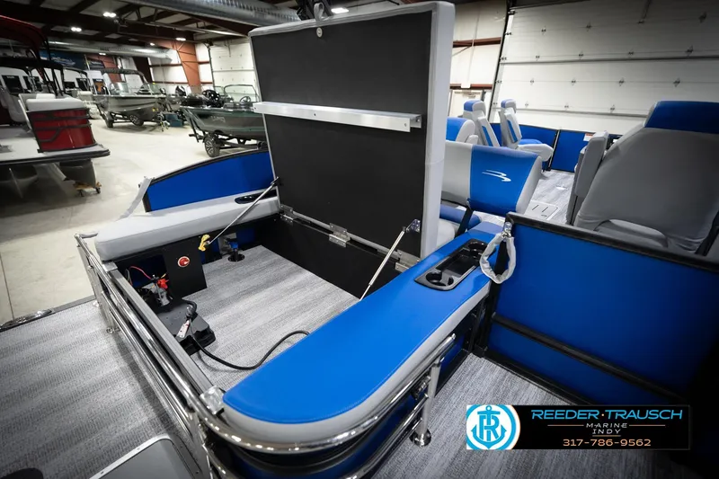 Slide: The Image of 2026 Bennington 22 SSB boat dashboard with steering wheel and control panel. - 33