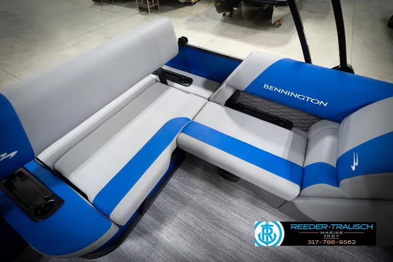 Slide: The Image of Luxury seating on 2026 Bennington 22 SSB pontoon boat, featuring blue and gray upholstery. - 45