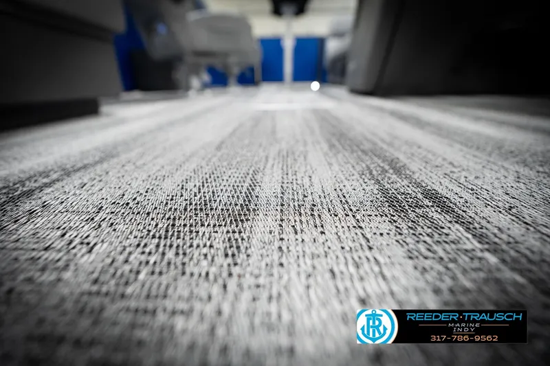 Slide: The Image of 2026 Bennington 22 SSB boat logo on blue background, Reeder-Trausch Marine contact info. - 51