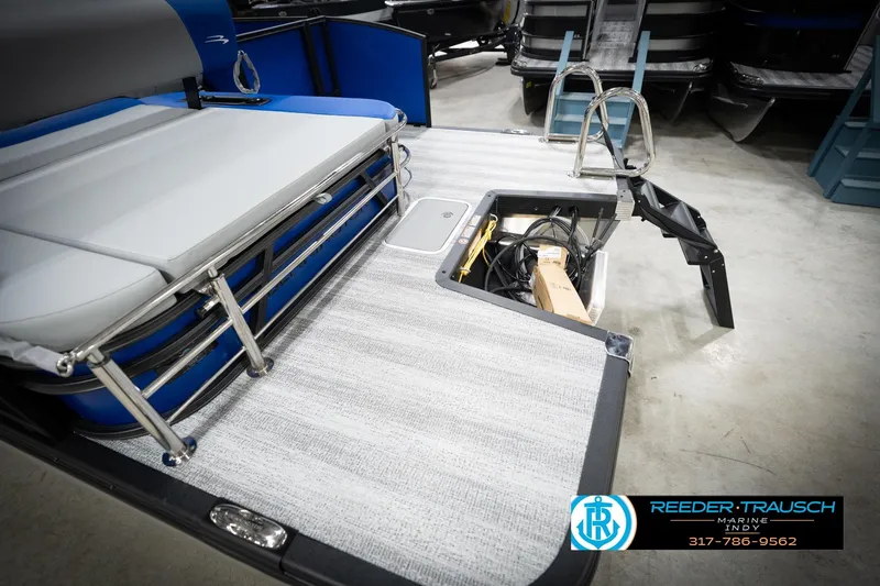 Slide: The Image of 2026 Bennington 22 SSB pontoon boat interior with storage compartment and seating. - 61