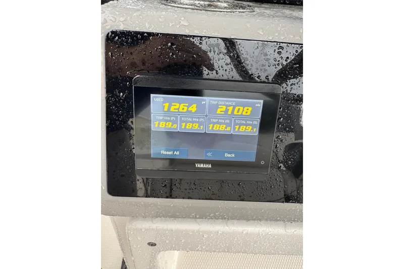 Slide: The Image of Yamaha display on 2023 Robalo R250 Center Console, showing trip and usage data. - 22