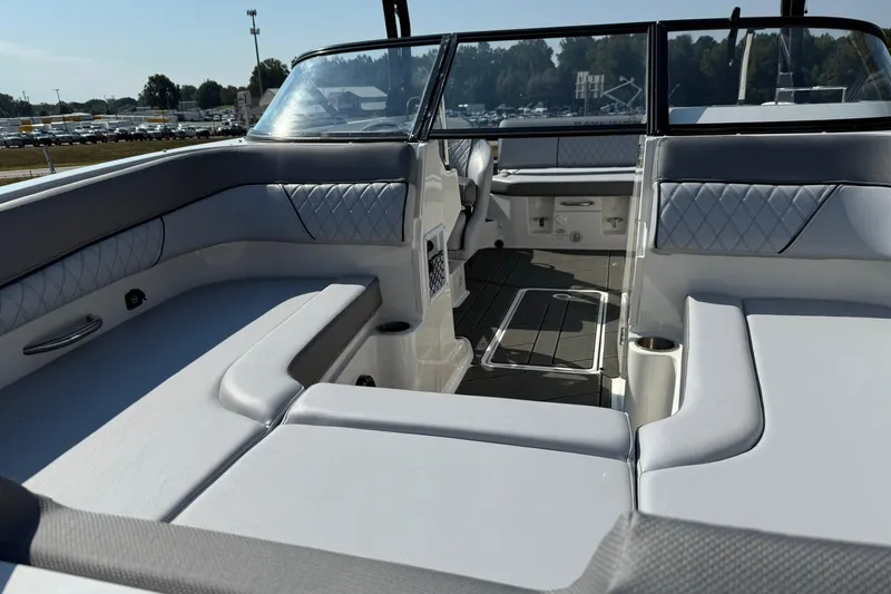 Slide: The Image of Interior of 2025 Bayliner D22I boat with luxurious seating and modern design. - 18