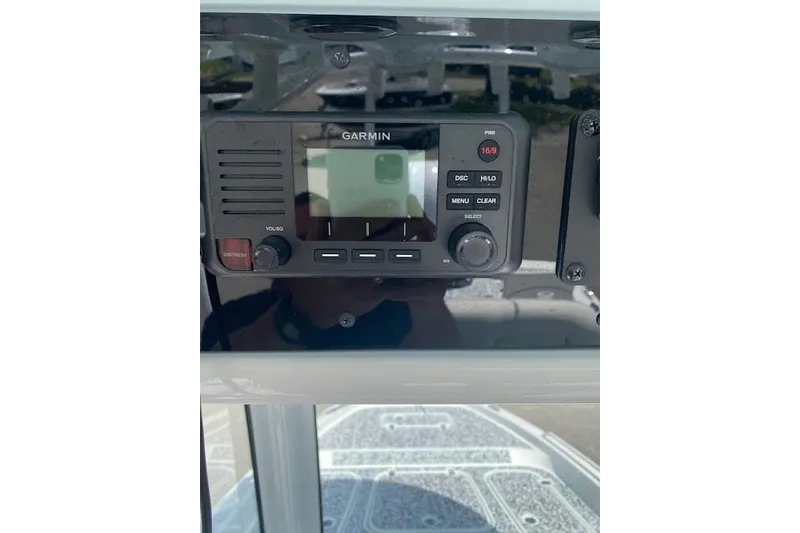 Slide: The Image of 2024 Sea Hunt BX 25 FS boat with Garmin marine radio display. - 15