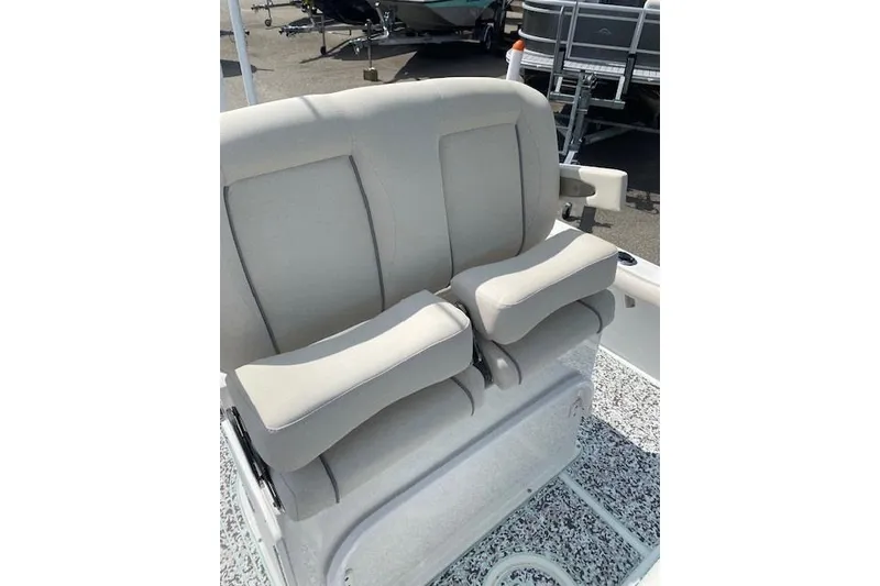 Slide: The Image of 2024 Sea Hunt BX 25 FS boat seating with cushioned armrests, showcasing comfort and style. - 16
