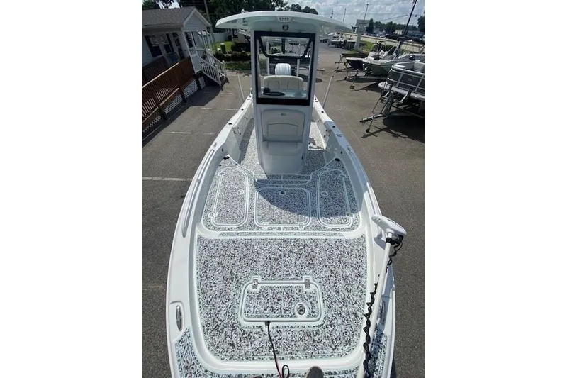 Slide: The Image of 2024 Sea Hunt BX 25 FS boat with spacious deck and modern design. - 25