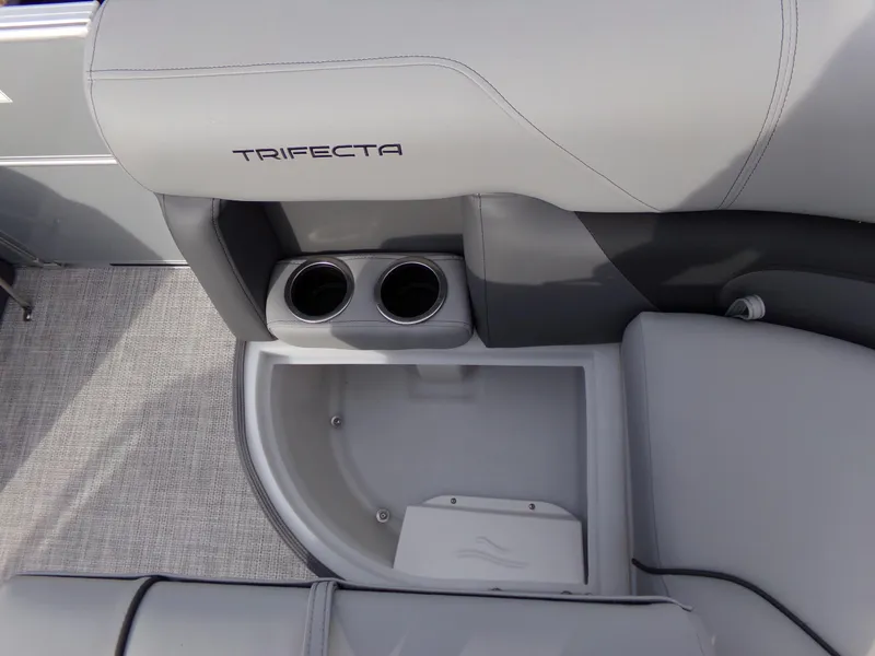 Slide: The Image of 2023 Trifecta 20C CS boat interior with cup holders and seating. - 10
