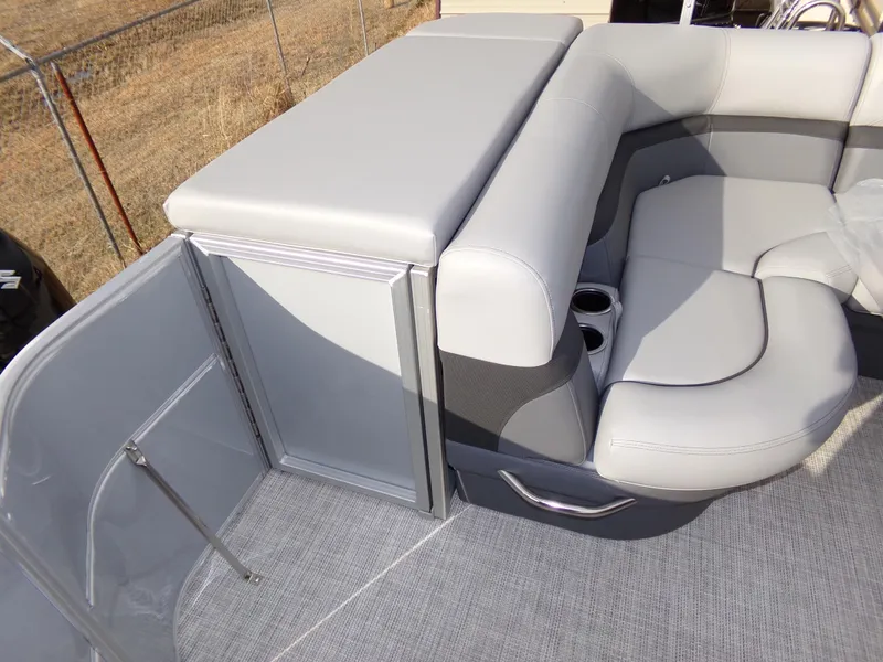 Slide: The Image of 2023 Trifecta 20C CS boat interior with gray seating and cup holders. - 23