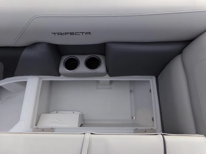 Slide: The Image of Interior of 2023 Trifecta 20C CS boat with cup holders and storage compartment. - 7