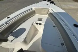Slide: The Image of 2024 Key West 219 FS boat interior with seating and storage compartments. - 15