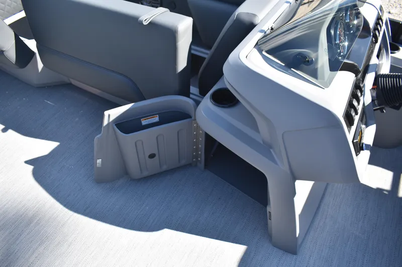 Slide: The Image of 2026 Godfrey SWEETWATER SW 2086 C boat interior with open storage compartment. - 13