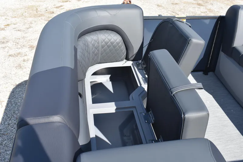 Slide: The Image of 2026 Godfrey SWEETWATER SW 2086 C boat interior with open storage compartment. - 19
