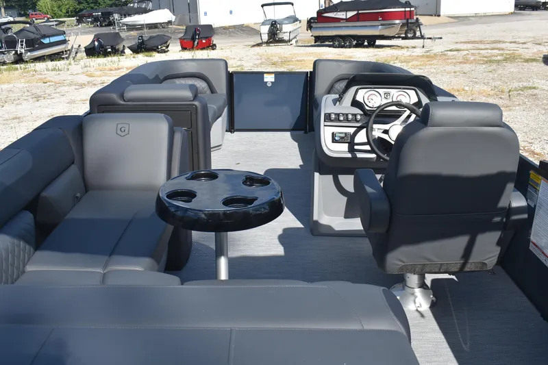 Slide: The Image of Interior of 2026 Godfrey SWEETWATER SW 2086 C pontoon boat with seating and helm. - 2