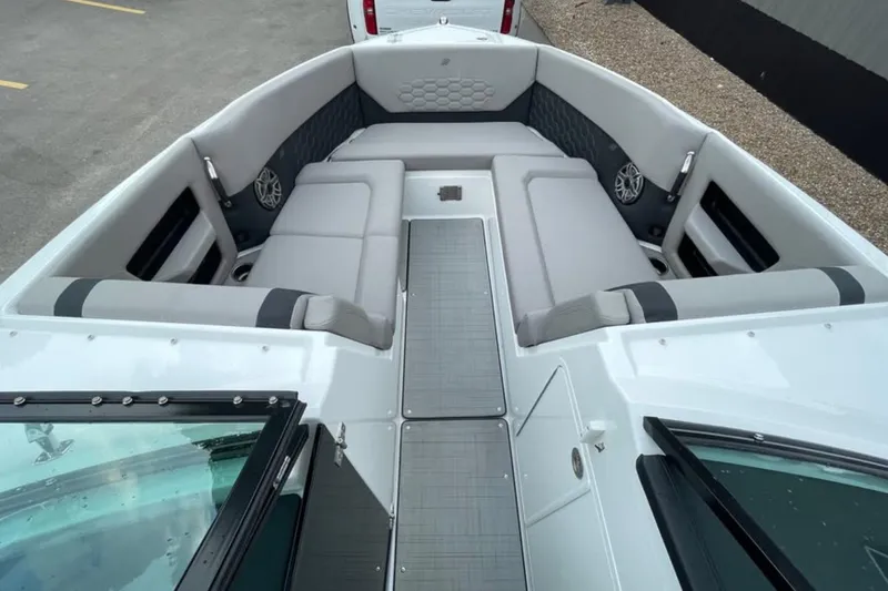 Slide: The Image of 2026 Four Winns H9 boat interior with spacious seating and modern design. - 4