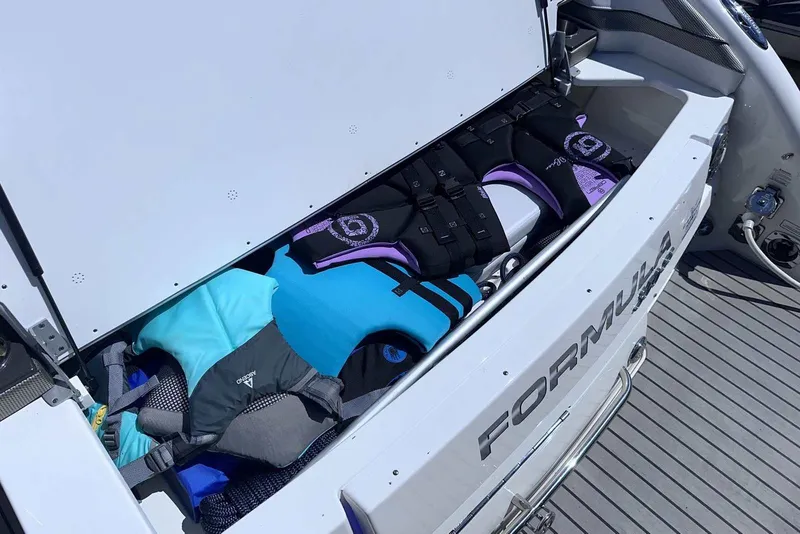 Slide: The Image of Storage compartment of 2018 Formula 350 Sun Sport boat with life jackets. - 10