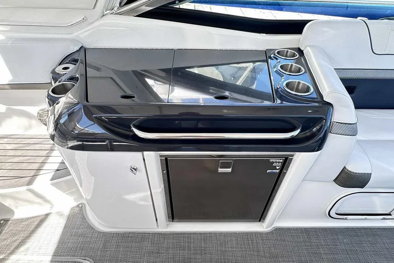 Slide: The Image of 2018 Formula 350 Sun Sport yacht interior with sleek kitchenette and cup holders. - 16