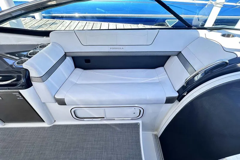 Slide: The Image of 2018 Formula 350 Sun Sport boat interior with sleek white seating and modern design. - 19