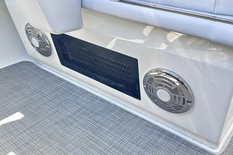 Slide: The Image of 2018 Formula 350 Sun Sport boat interior with speakers and cushioned seating. - 25