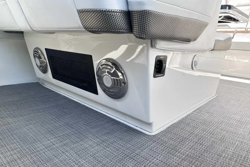 Slide: The Image of 2018 Formula 350 Sun Sport boat interior with speakers and seating detail. - 26