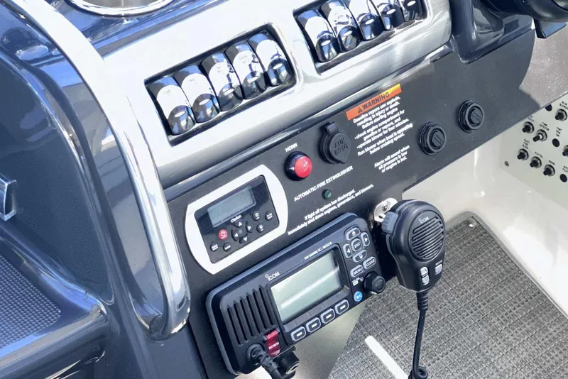 Slide: The Image of Control panel of a 2018 Formula 350 Sun Sport boat with communication devices. - 30