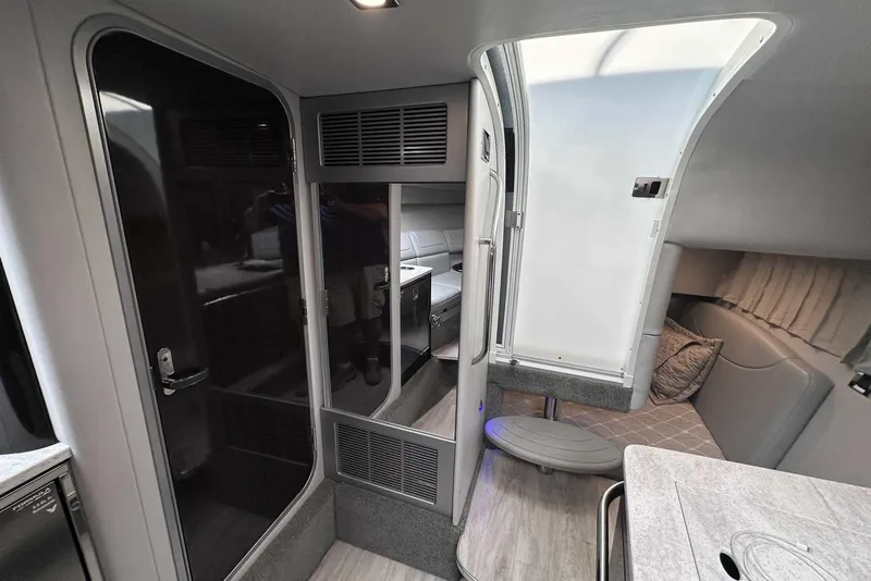 Slide: The Image of Interior of a 2018 Formula 350 Sun Sport boat, featuring modern design and comfortable seating. - 38