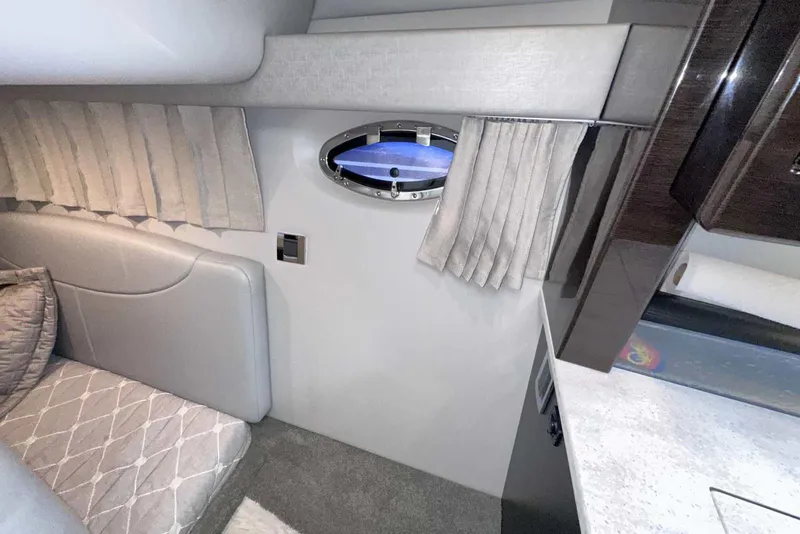 Slide: The Image of Interior cabin of 2018 Formula 350 Sun Sport with porthole and modern furnishings. - 44