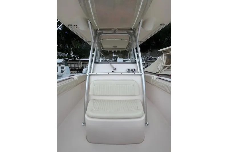Slide: The Image of 2011 Grady-White Canyon 306 boat interior with seating and console. - 12