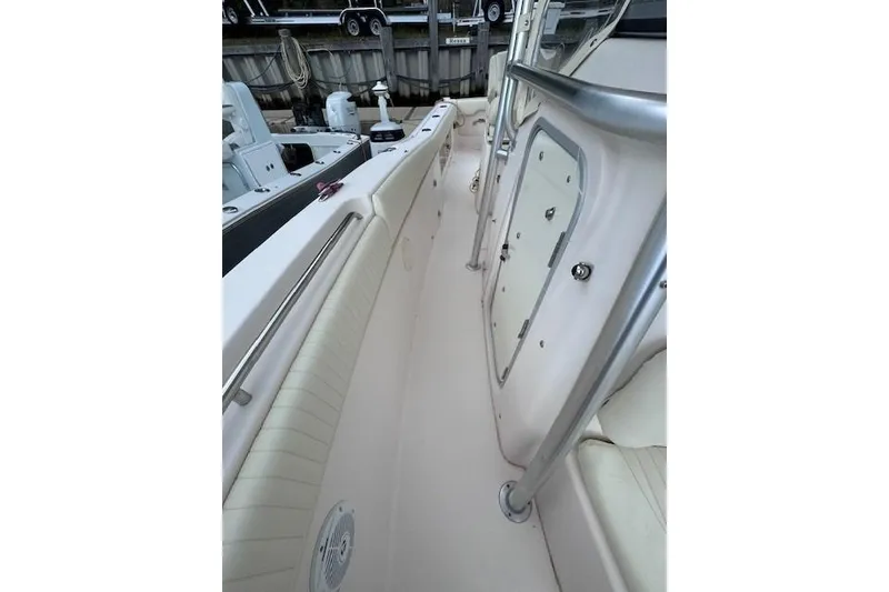 Slide: The Image of 2011 Grady-White Canyon 306 boat interior with sleek design and stainless steel features. - 21