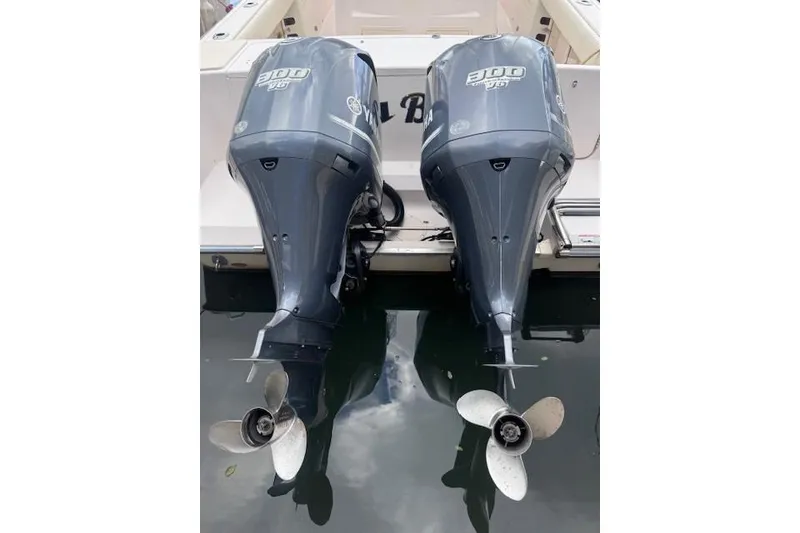 Slide: The Image of Twin Yamaha 300 outboard engines on a 2011 Grady-White Canyon 306 boat. - 3