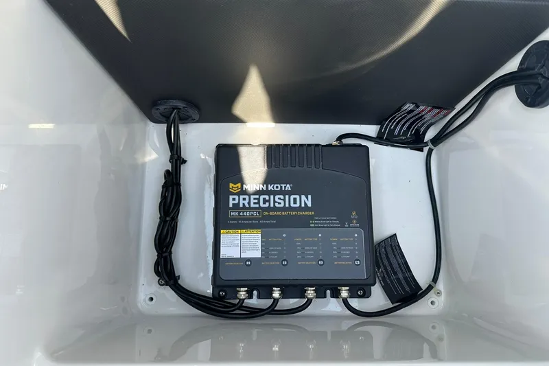 Slide: The Image of Minn Kota Precision MK 440PC battery charger in 2026 Lund 185 Impact GL boat. - 24