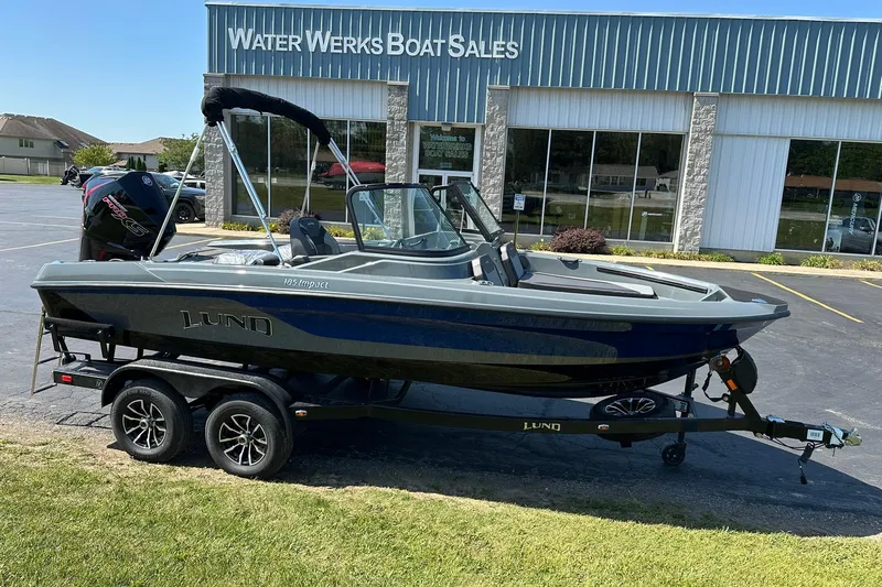 Slide: The Image of 2026 Lund 185 Impact GL boat on trailer at Water Werks Boat Sales. - 3