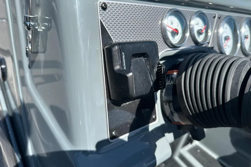 Slide: The Image of Dashboard of 2026 Lund 185 Impact GL boat with gauges and controls. - 38