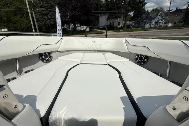 Slide: The Image of 2026 Regal LS4 boat interior with white seating and modern design. - 12