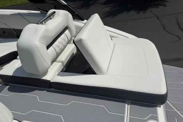 Slide: The Image of 2026 Regal LS4 boat with luxurious white seating and sleek design. - 21