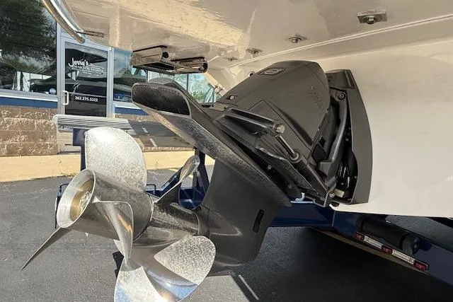 Slide: The Image of 2026 Regal LS4 boat with a shiny propeller and outboard motor detail. - 31