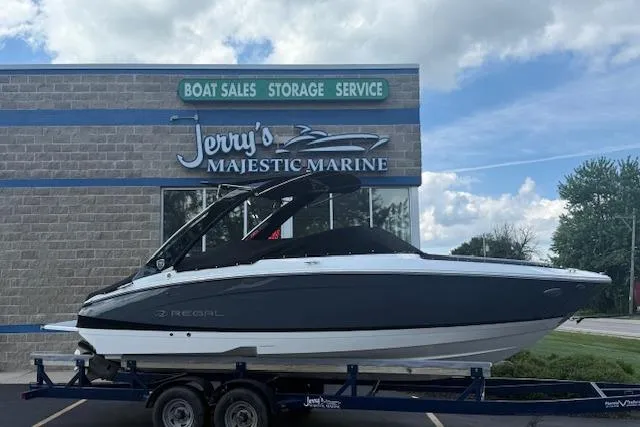 Slide: The Image of 2026 Regal LS4 boat on trailer at Jerry's Majestic Marine dealership. - 34