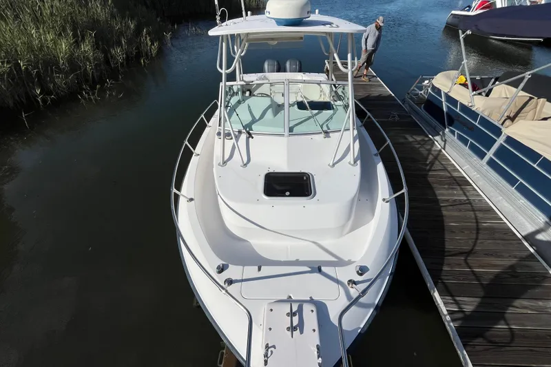 Slide: The Image of 1999 Grady-White Gulfstream 232 boat docked at marina, top view. - 20