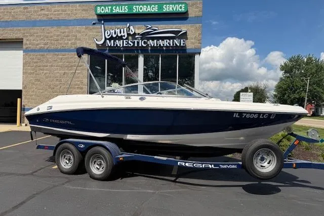 Slide: The Image of 2012 Regal 2000 Bowrider boat on trailer at Jerry's Majestic Marine dealership. - 0
