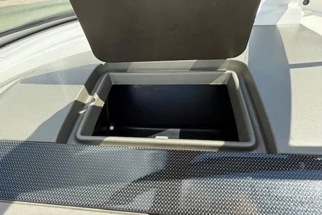Slide: The Image of Open storage compartment on a 2012 Regal 2000 Bowrider boat. - 11