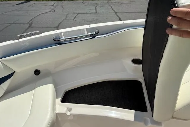 Slide: The Image of 2012 Regal 2000 Bowrider interior with seating and storage compartment. - 15